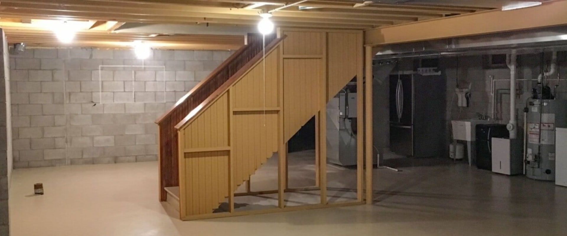 The Importance of Waterproofing and Insulation in Basement Remodeling